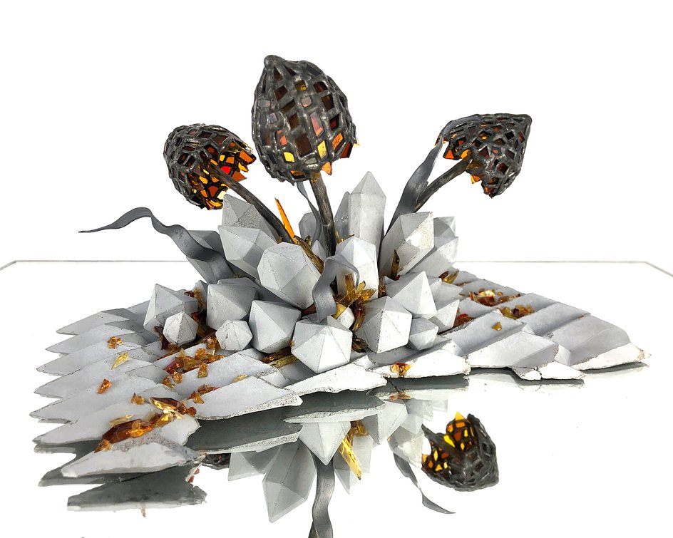 Lex Shute_Freedom Caps, 2025. Stained glass, lead, tin, concrete, 13x26x22cm.