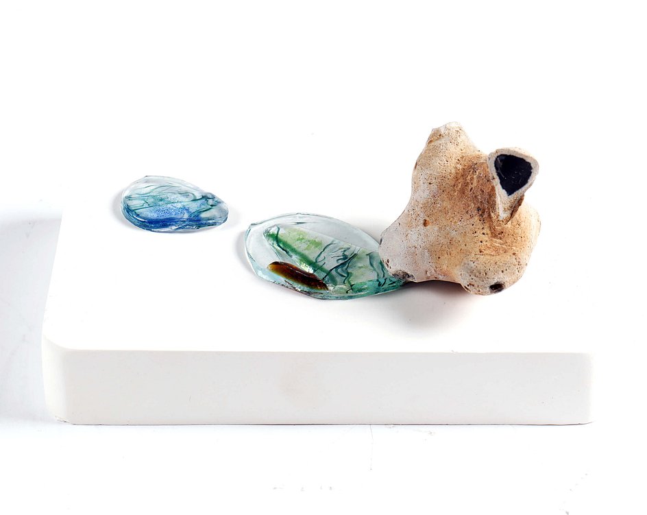 Lex Shute_Mermaid, 2018. Flint, glass, plaster, 9x20x12cm_web